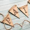 Personalised bunting with wooden letters for nursery decor. Name bunting. Wooden name sign. Wooden lettering. Wooden letters for wall - 1 letter - Oak flg/Walnut ltr